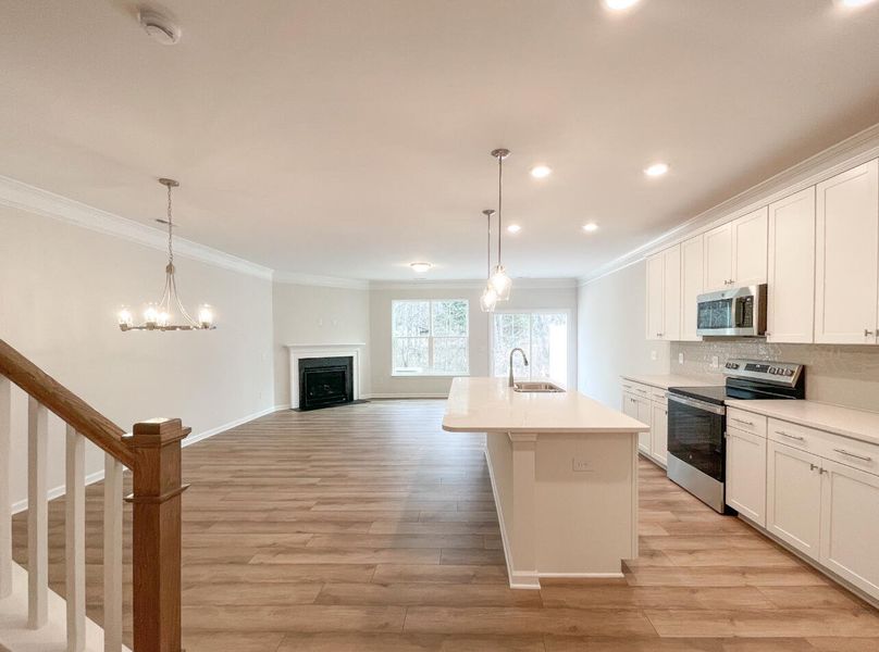 Furnished interior view inside a new home in Attenborough Townhomes, Piedmont (Image 5). Furnished interior view inside a new home in Attenborough Townhomes, Piedmont (Image 5).