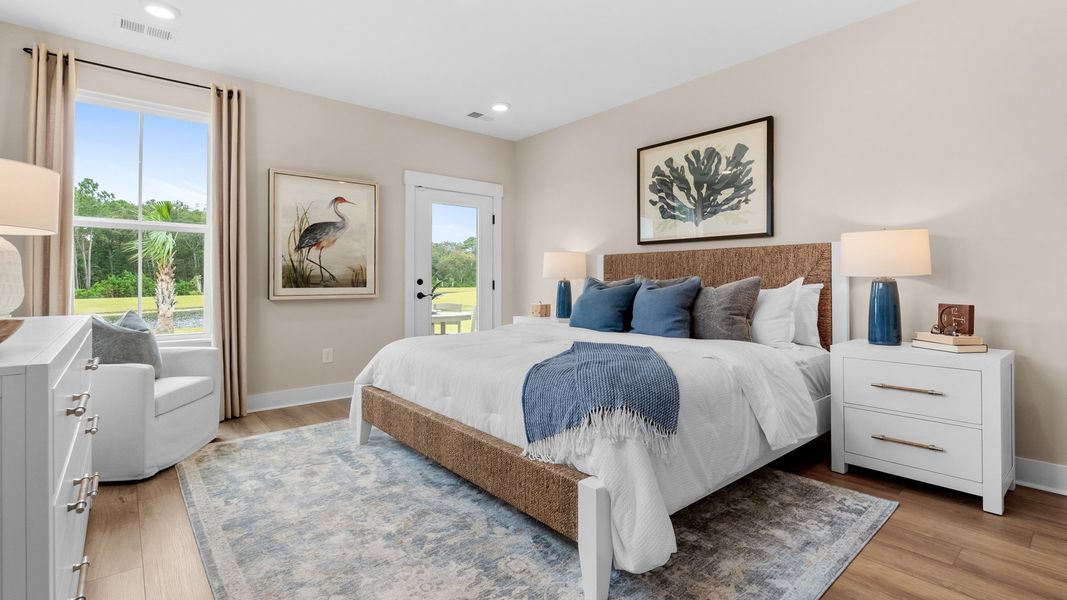 The Summit primary suite offers a spacious retreat with comfort and style.