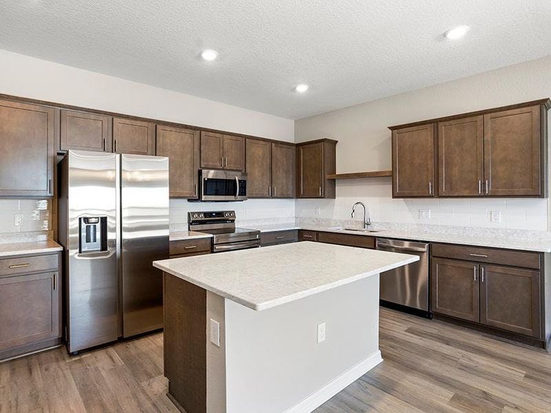 Or warm wood tones - Flora townhome by Highland Homes