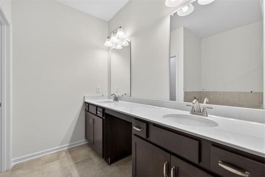 Furnished interior view inside a new home in Jameson Towns, Villa Rica (Image 4).