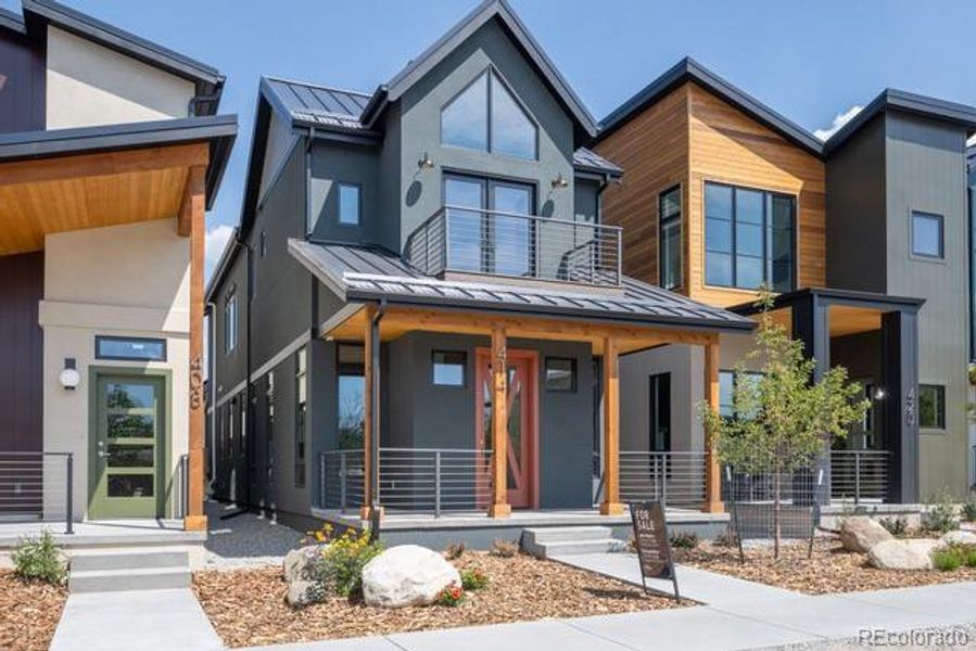Front exterior of a new home in , Buena Vista, CO, highlighting curb appeal (Image 1).