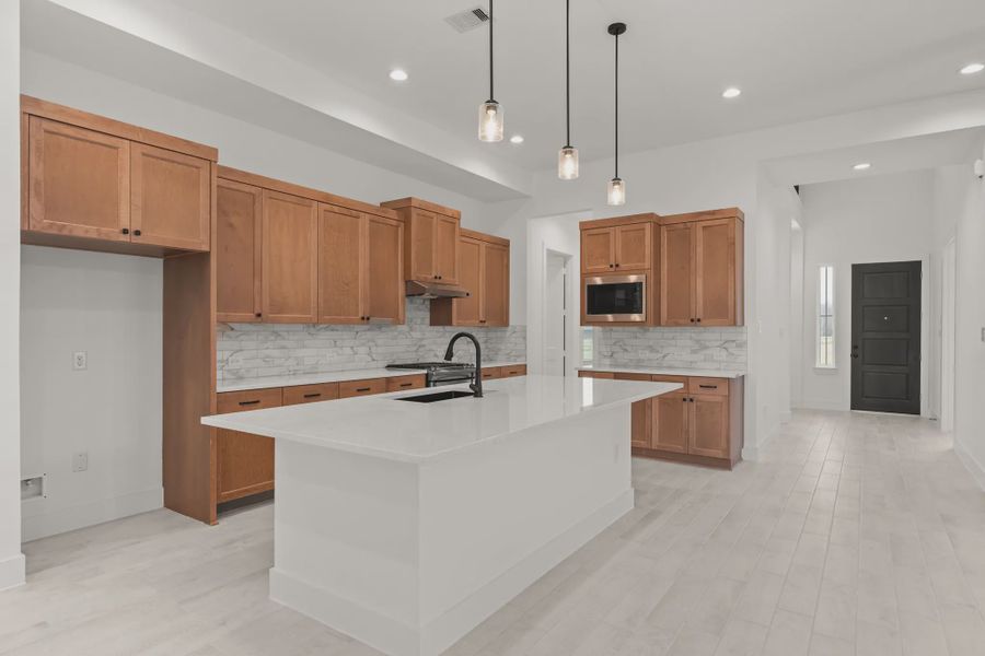 Representative furnished interior of a home built from the Sorenstam by Chesmar Homes in Riceland Alley Loads, Mont Belvieu (Image 48).