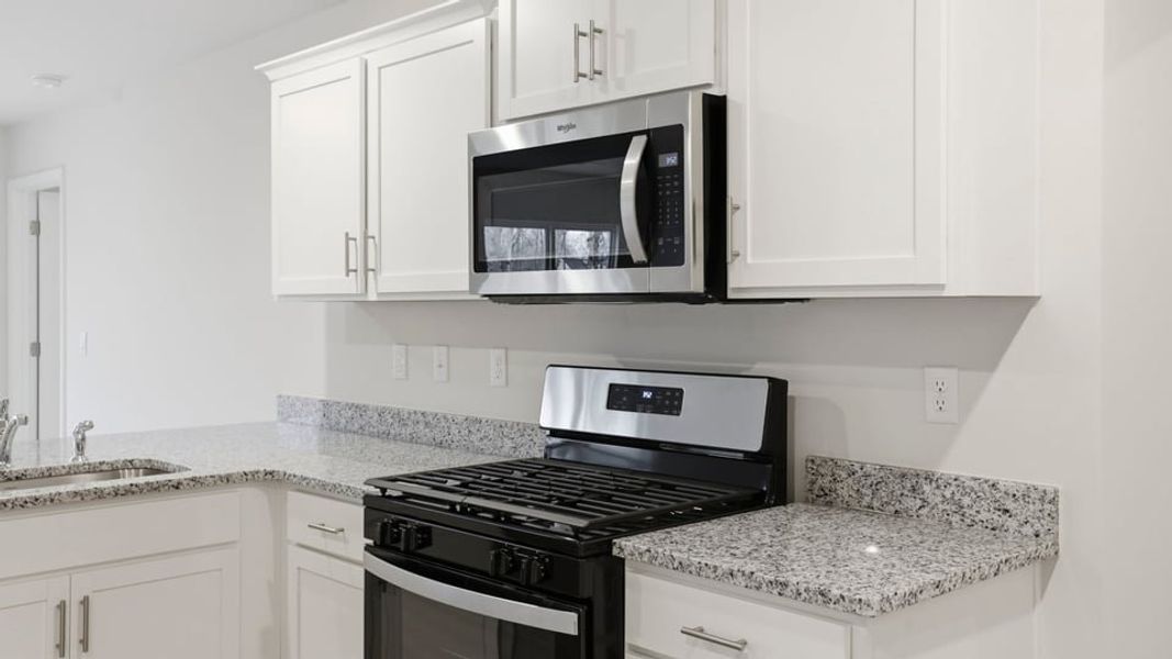 Furnished interior view inside a new home in Bentley Park, Greenwood (Image 9).
