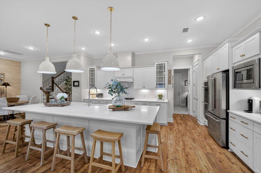 Furnished interior view inside a new home in K. Hovnanian's® Four Seasons at Lakes of Cane Bay, Summerville (Image 15).