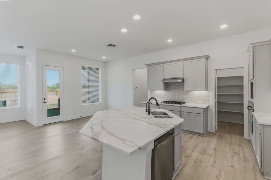 Representative furnished interior of a home built from the Shea by Chesmar Homes in The Crossvine, Forney (Image 4).