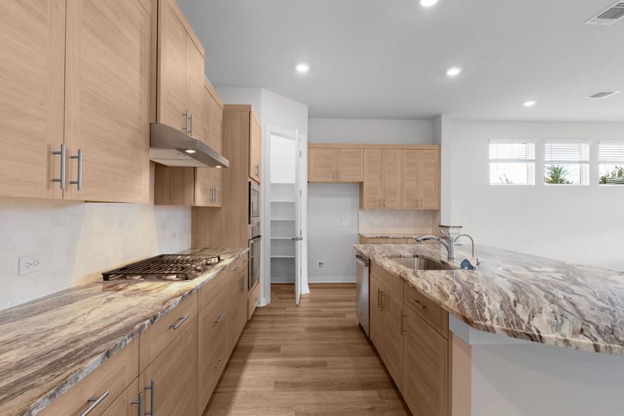 Furnished interior view inside a new home in The Grove at Blackhawk, Pflugerville (Image 16). Furnished interior view inside a new home in The Grove at Blackhawk, Pflugerville (Image 16).