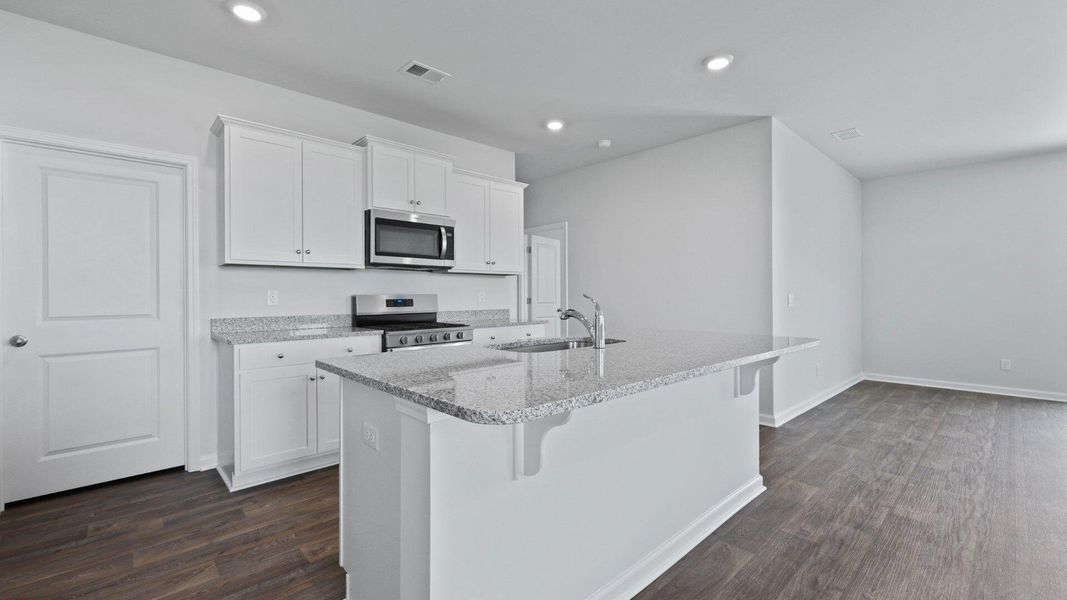 Furnished interior view inside a new home in Pine Hills at Cane Bay, Summerville (Image 8). Furnished interior view inside a new home in Pine Hills at Cane Bay, Summerville (Image 8).