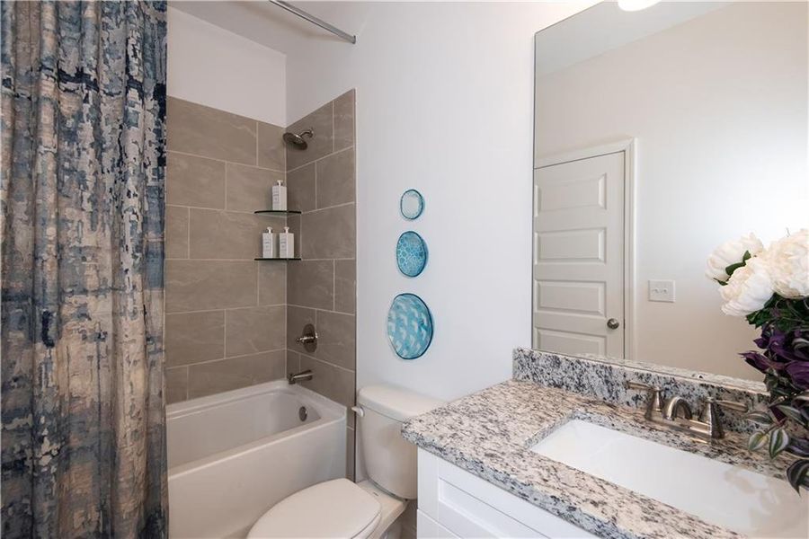 Furnished interior view inside a new home in Towns at Enclave, Lawrenceville (Image 6). Furnished interior view inside a new home in Towns at Enclave, Lawrenceville (Image 6).