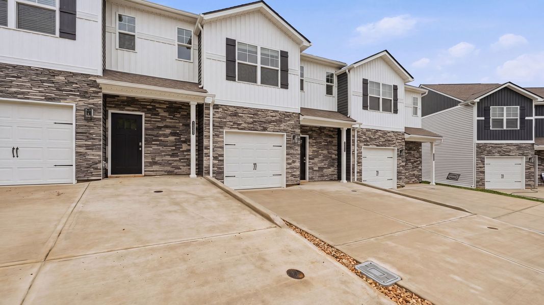 Front exterior of a new home in The Arbor Townhomes, Kingsport, TN, highlighting curb appeal (Image 2).