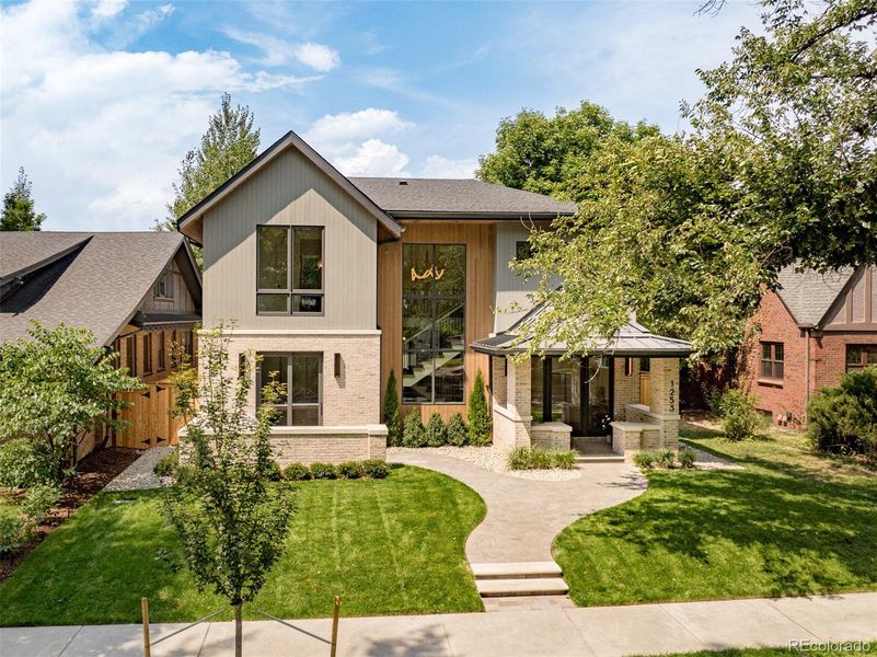 Front exterior of a new home in , Denver, CO, highlighting curb appeal (Image 2).