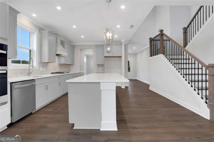 Furnished interior view inside a new home in The Paddocks at Doc Hughes, Buford (Image 5).