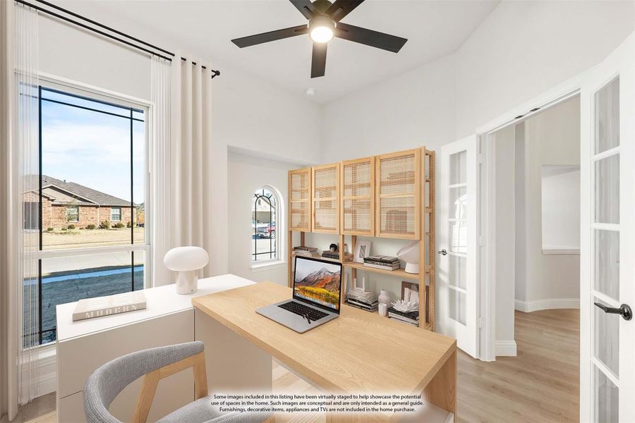 Home office with wood desk, open shelving, ceiling fan, and large window with neighborhood view