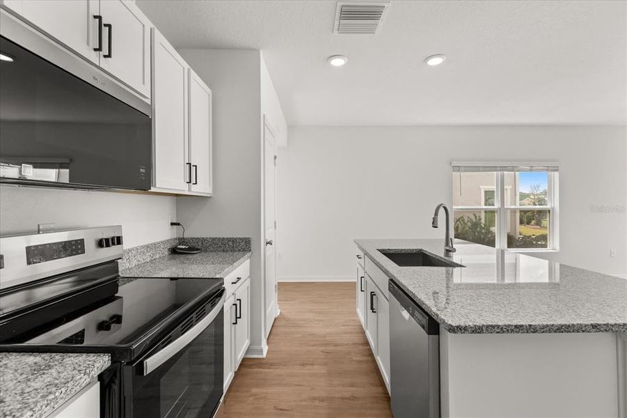 Furnished interior view inside a new home in Reserve at Forest Lake Townhomes, Lake Wales (Image 7). Furnished interior view inside a new home in Reserve at Forest Lake Townhomes, Lake Wales (Image 7).