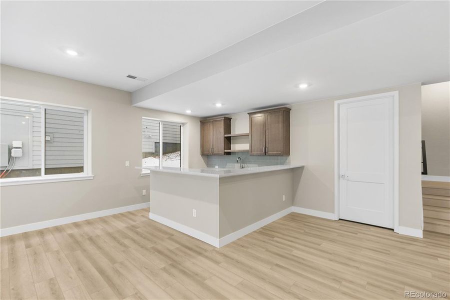 Furnished interior view inside a new home in Autograph at Lyric, Lone Tree (Image 20).