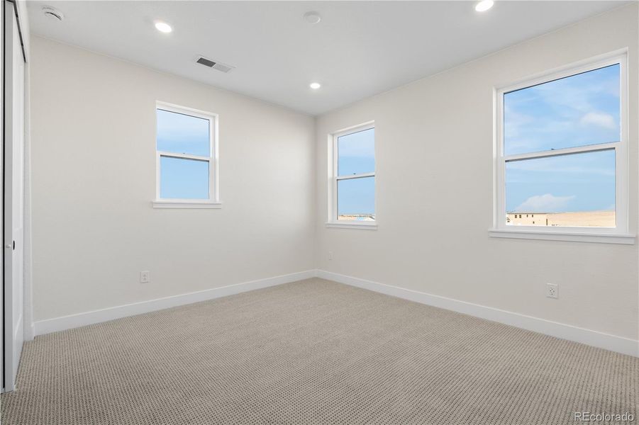 Spacious, unfurnished interior of a new home in Autograph at Lyric, Lone Tree (Image 24).