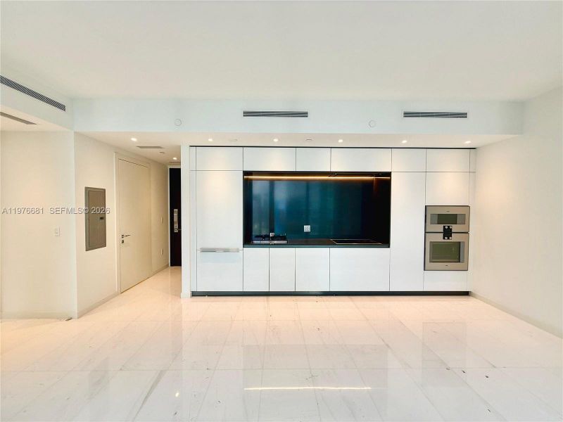 Spacious, unfurnished interior of a new home in Aston Martin Residences, Miami (Image 5).
