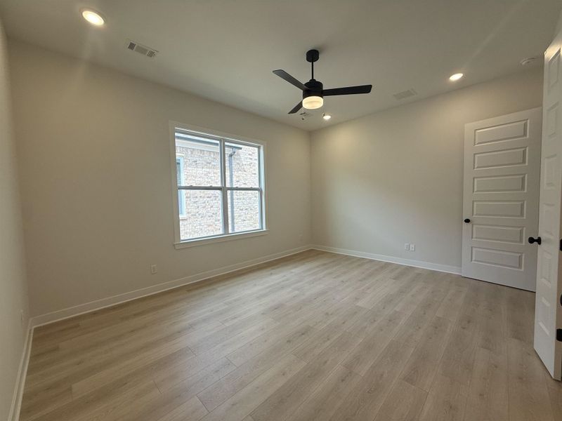 Spare room with recessed lighting, light wood-type flooring, and ceiling fan