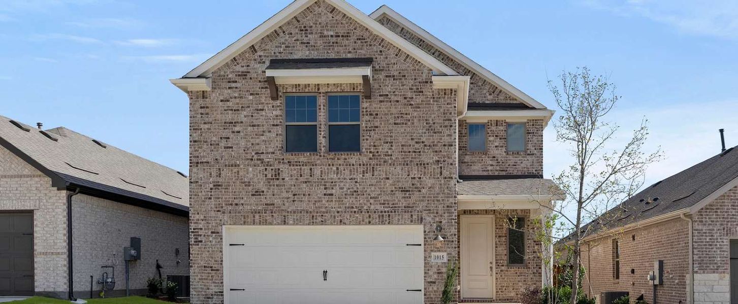 Representative exterior photo of a completed home built from the Willett by Ashton Woods in Century Farms, Celina, TX (Image 19).