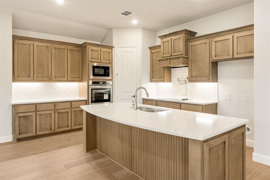 Furnished interior view inside a new home in Sunrise at Garden Valley 60-79, Waxahachie (Image 4).