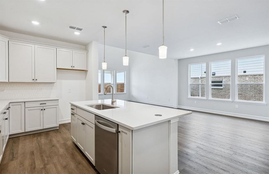 Pendant lighting over island