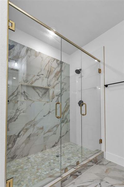 Bathroom Shower with elegant glass door and beautiful tile Bathroom Shower with elegant glass door and beautiful tile