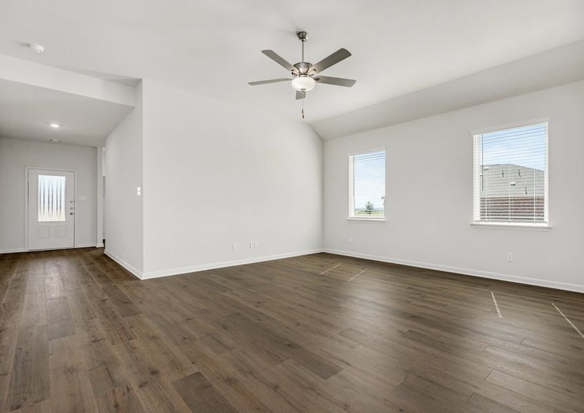 The living room has large windows that let in great, natural light. The living room has large windows that let in great, natural light.