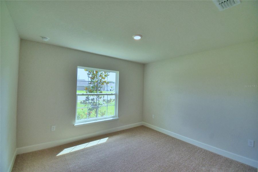 Spacious, unfurnished interior of a new home in Cadence Crossing, Auburndale (Image 28).