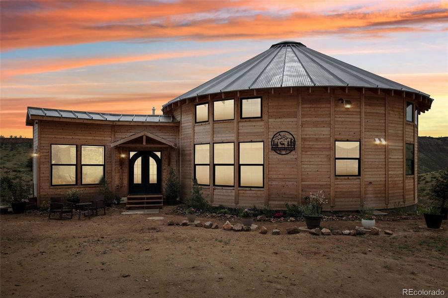 Front exterior of a new home in , Lyons, CO, highlighting curb appeal (Image 28).