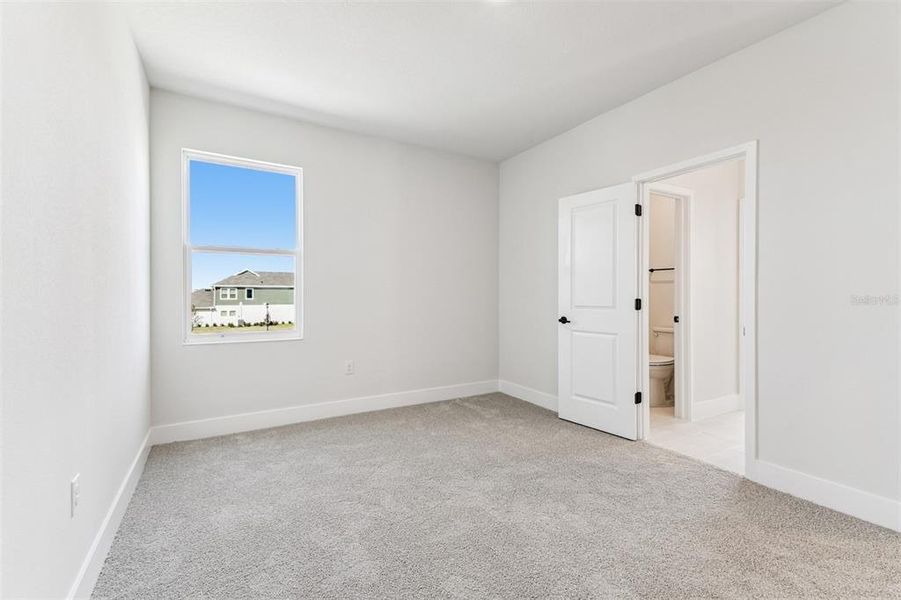 Spacious, unfurnished interior of a new home in Waterset Tradition Series, Apollo Beach (Image 36).