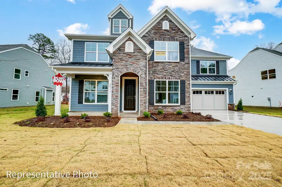 Front exterior of a new home in Harmony, Harrisburg, NC, highlighting curb appeal (Image 1). Front exterior of a new home in Harmony, Harrisburg, NC, highlighting curb appeal (Image 1).