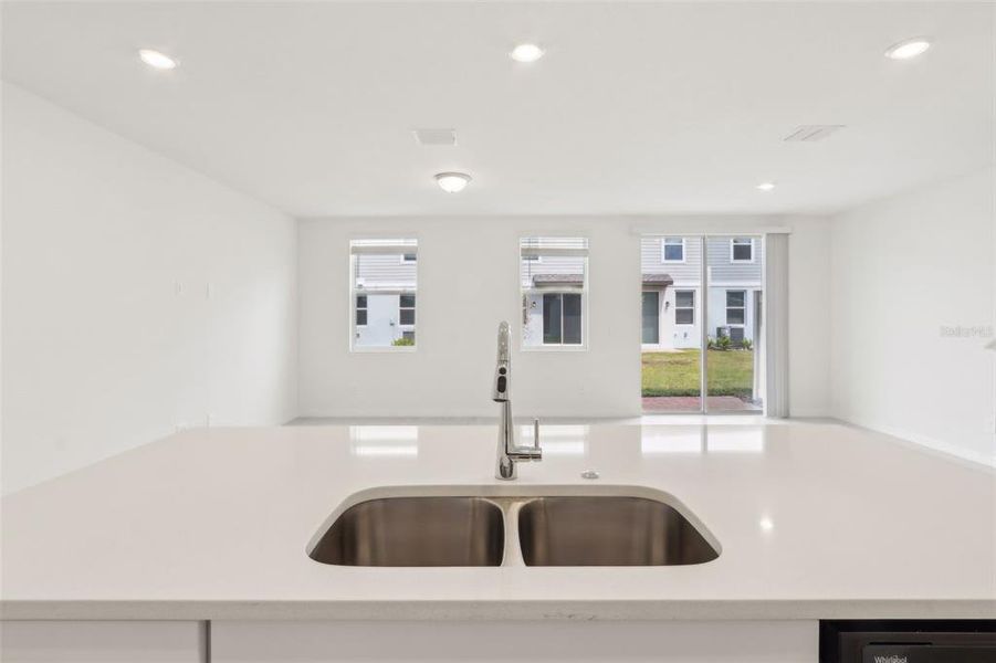 Furnished interior view inside a new home in The Meadow at Crossprairie Townes, St. Cloud (Image 8).