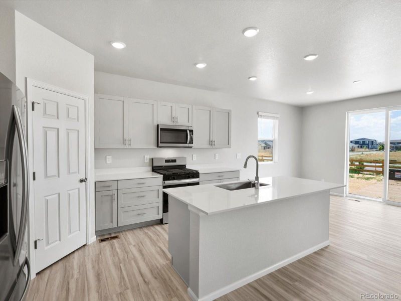 Furnished interior view inside a new home in Ridgeline Vista: The Canyon Collection, Brighton (Image 5).