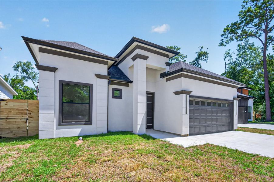 Front exterior of a new home in , Conroe, TX, highlighting curb appeal (Image 25).