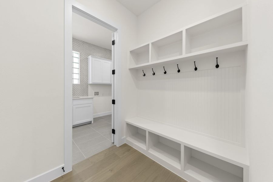 Representative unfurnished interior of a home built from the 5551 by Tradition Homes in Windsong Ranch, Prosper (Image 28).