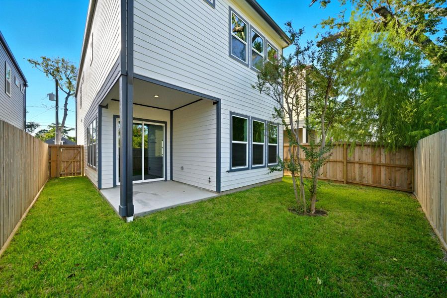 Exterior details and patio area of a home in , Houston (Image 1). Exterior details and patio area of a home in , Houston (Image 1).