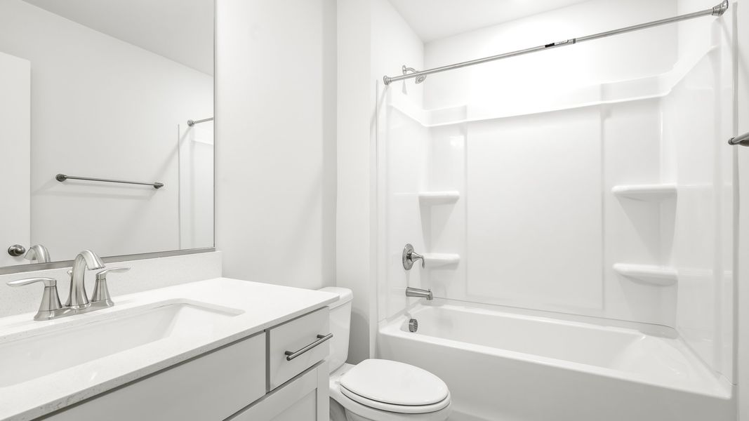 Furnished interior view inside a new home in Lybrook Village, Advance (Image 5).