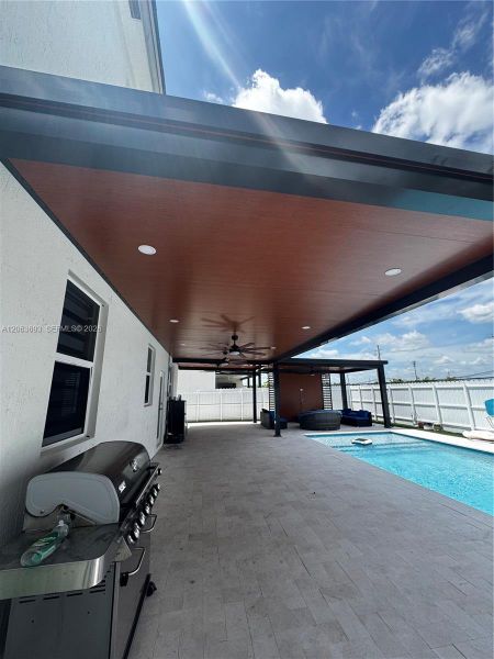 Exterior details and patio area of a home in Beacon at Galiano Pointe, Miami (Image 17). Exterior details and patio area of a home in Beacon at Galiano Pointe, Miami (Image 17).
