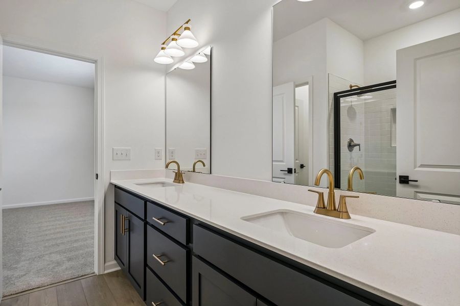 Primary Bath featuring the AW Collection® Sapphire - Clean white and cool hues define the space. Primary Bath featuring the AW Collection® Sapphire - Clean white and cool hues define the space.
