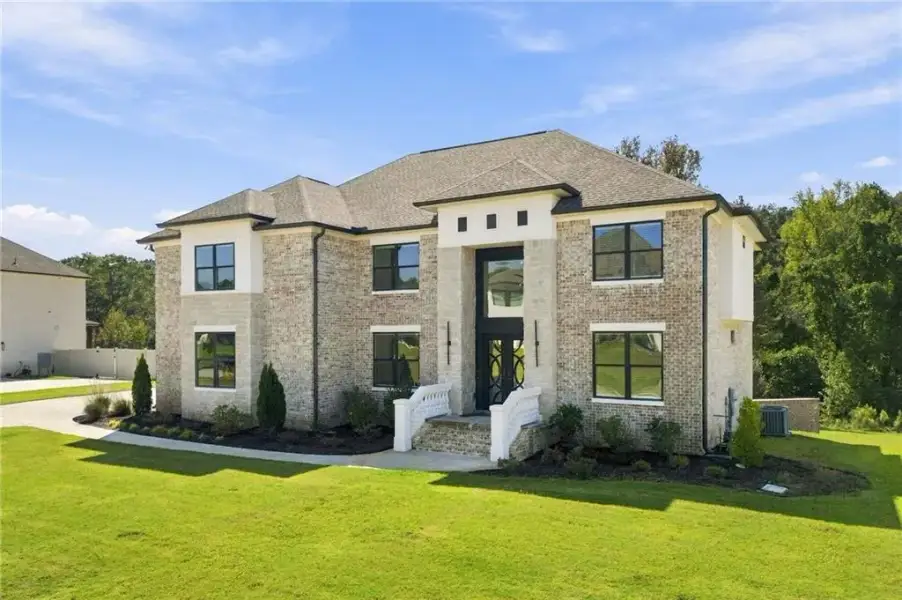 Front exterior of a new home in , Conyers, GA, highlighting curb appeal (Image 28).