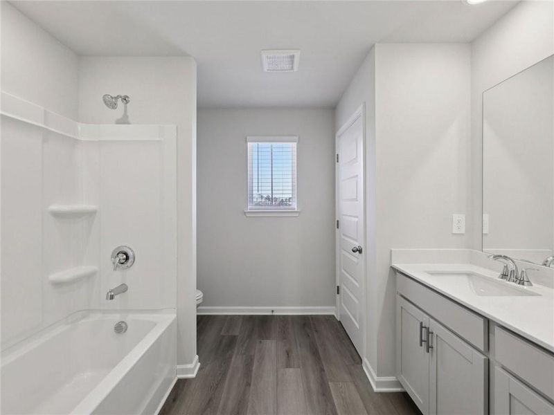 Furnished interior view inside a new home in Martin Springs - Estate Series, Lawrenceville (Image 9).