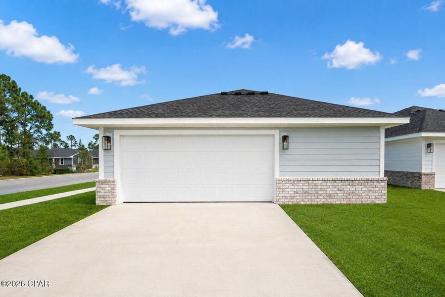Front exterior of a new home in East Bay, Panama City, FL, highlighting curb appeal (Image 11).