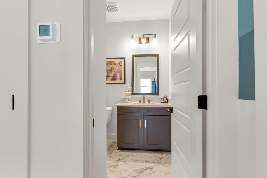 Furnished interior view inside a new home in Hidden Ponds Reserve, Awendaw (Image 24).