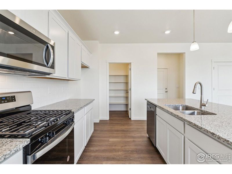 Furnished interior view inside a new home in Ridge at Johnstown, Johnstown (Image 8).