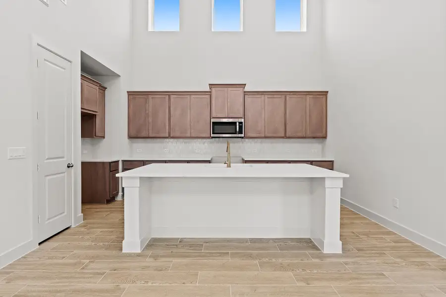 Furnished interior view inside a new home in Parmer Ranch, Georgetown (Image 6).