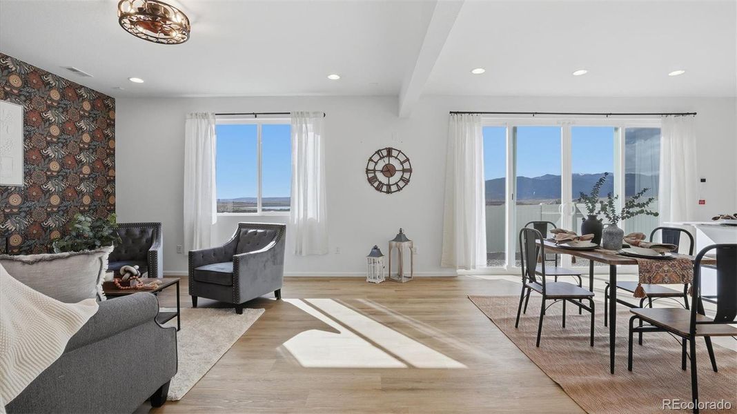 The Great Room flows seamlessly into the Dining Area and overlooks the backyard.