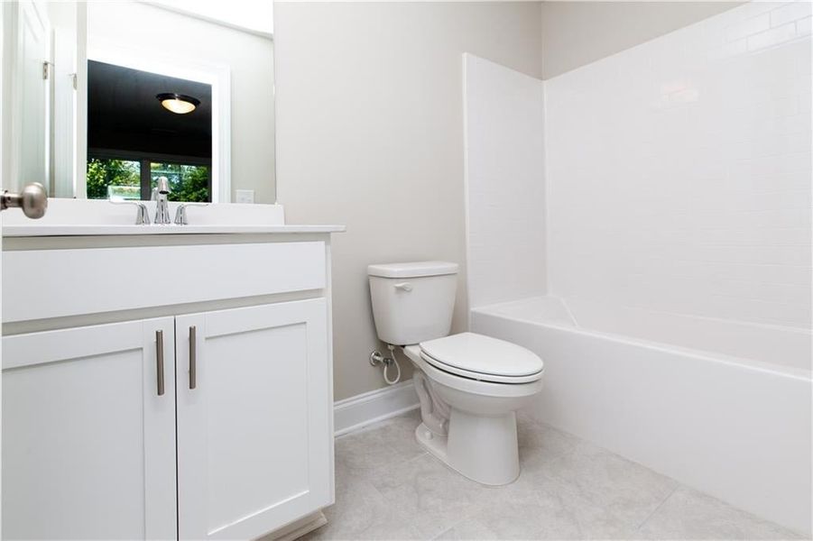 Terrace level bathroom.  This home will have a walkin shower in lieu of tub combo.  Photo not of actual home, but for representation purposes only.