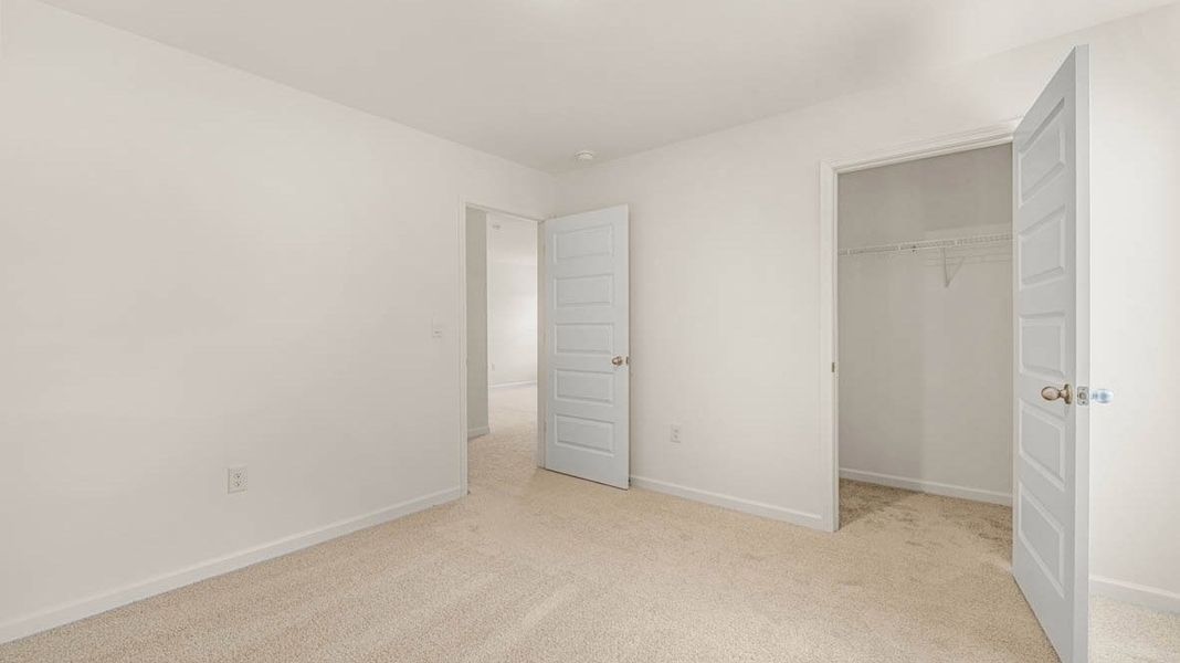 Representative unfurnished interior of a home built from the Dennis by D.R. Horton in Glenmaye, Hampton (Image 31).