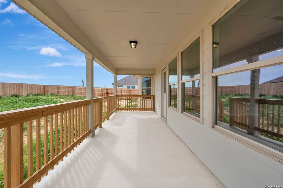 Exterior details and patio area of a home in Hickory Ridge Estates, Elmendorf (Image 21).
