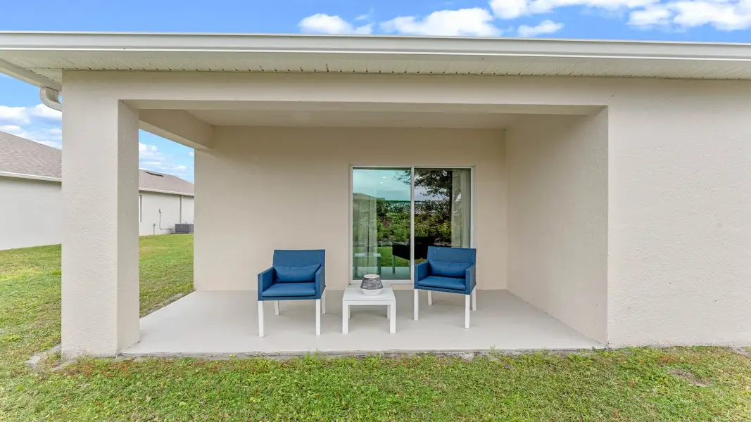 Exterior details and patio area of a home in Harmony West, St. Cloud (Image 3).