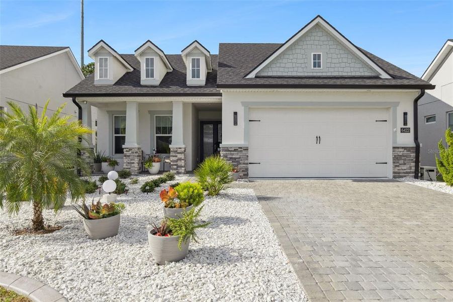 Front exterior of a new home in , Port Orange, FL, highlighting curb appeal (Image 23). Front exterior of a new home in , Port Orange, FL, highlighting curb appeal (Image 23).